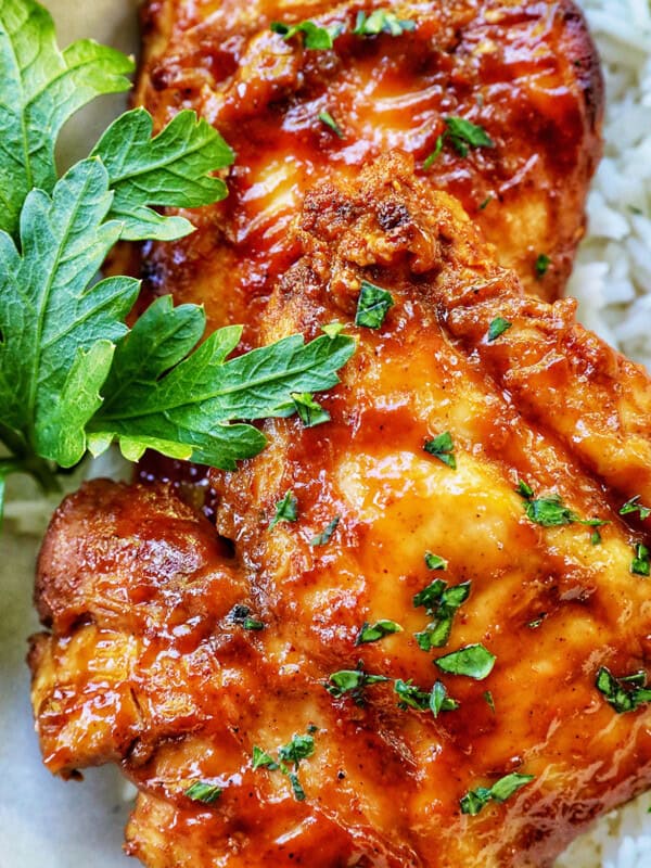 Slow Cooker Barbecue Chicken Thighs with white rice.
