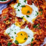 breakfast flatbread with eggs, bacon, and cheese.