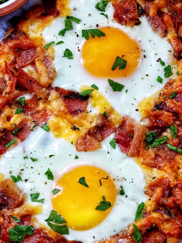 breakfast flatbread with eggs, bacon, and cheese.