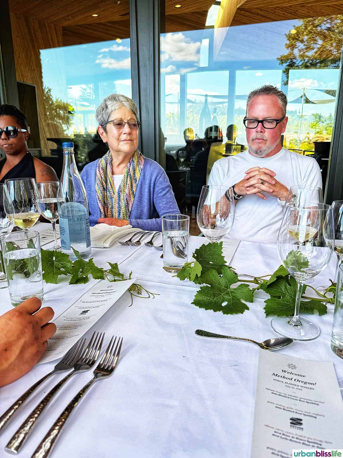 Susan Sokol Blosser and Andy Lytle seated at a dinner table.
