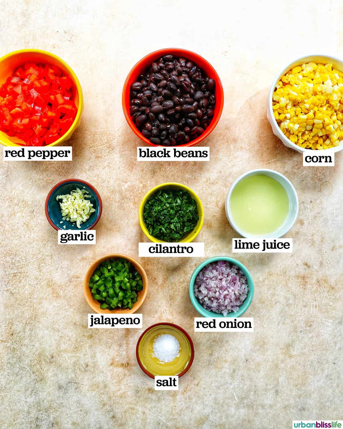 ingredients in bowls to make black bean corn dip.