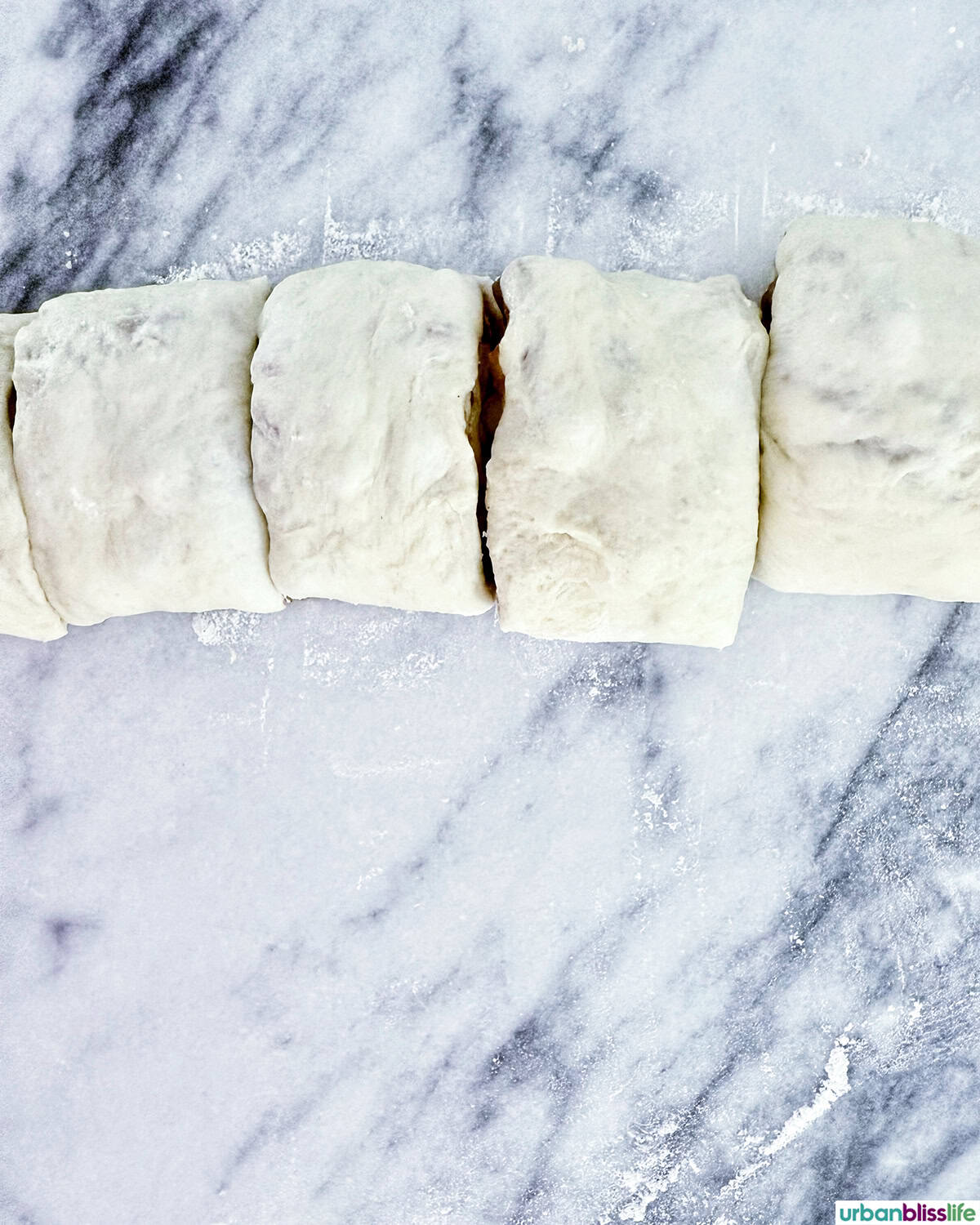 sliced cinnamon roll dough.