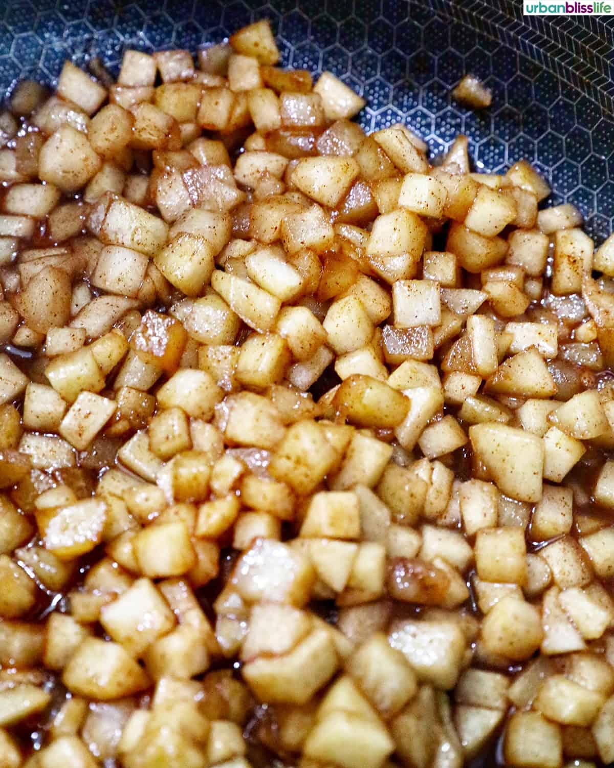 spiced diced apple pie filling in a pot.