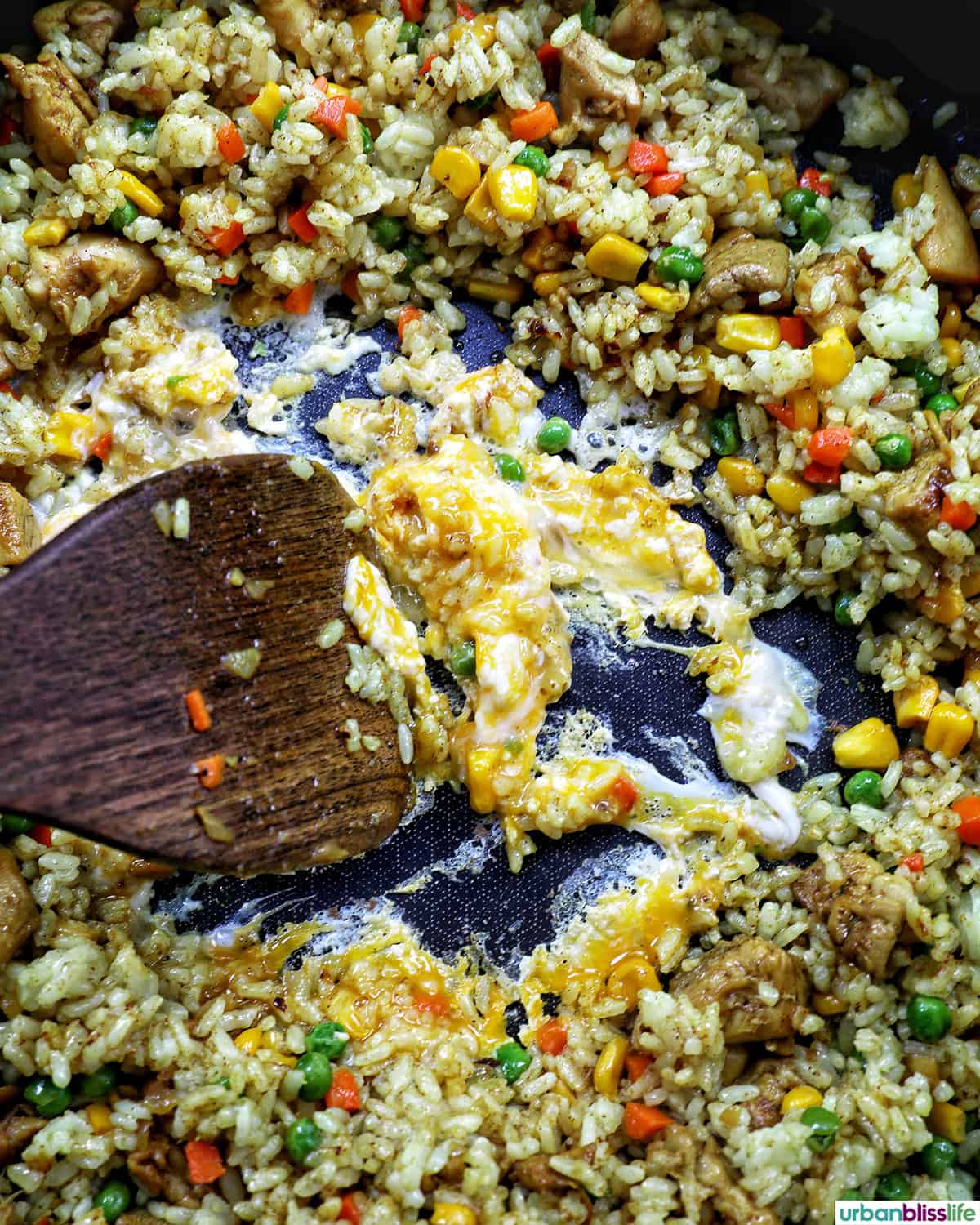 curry chicken fried rice in a pan.