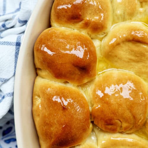 honey butter rolls in a serving platter.