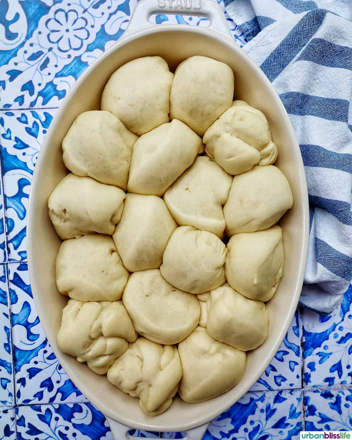 honey butter roll dough balls in a serving platter.