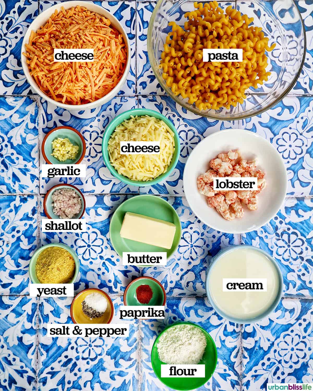 bowls of ingredients to make lobster mac and cheese.