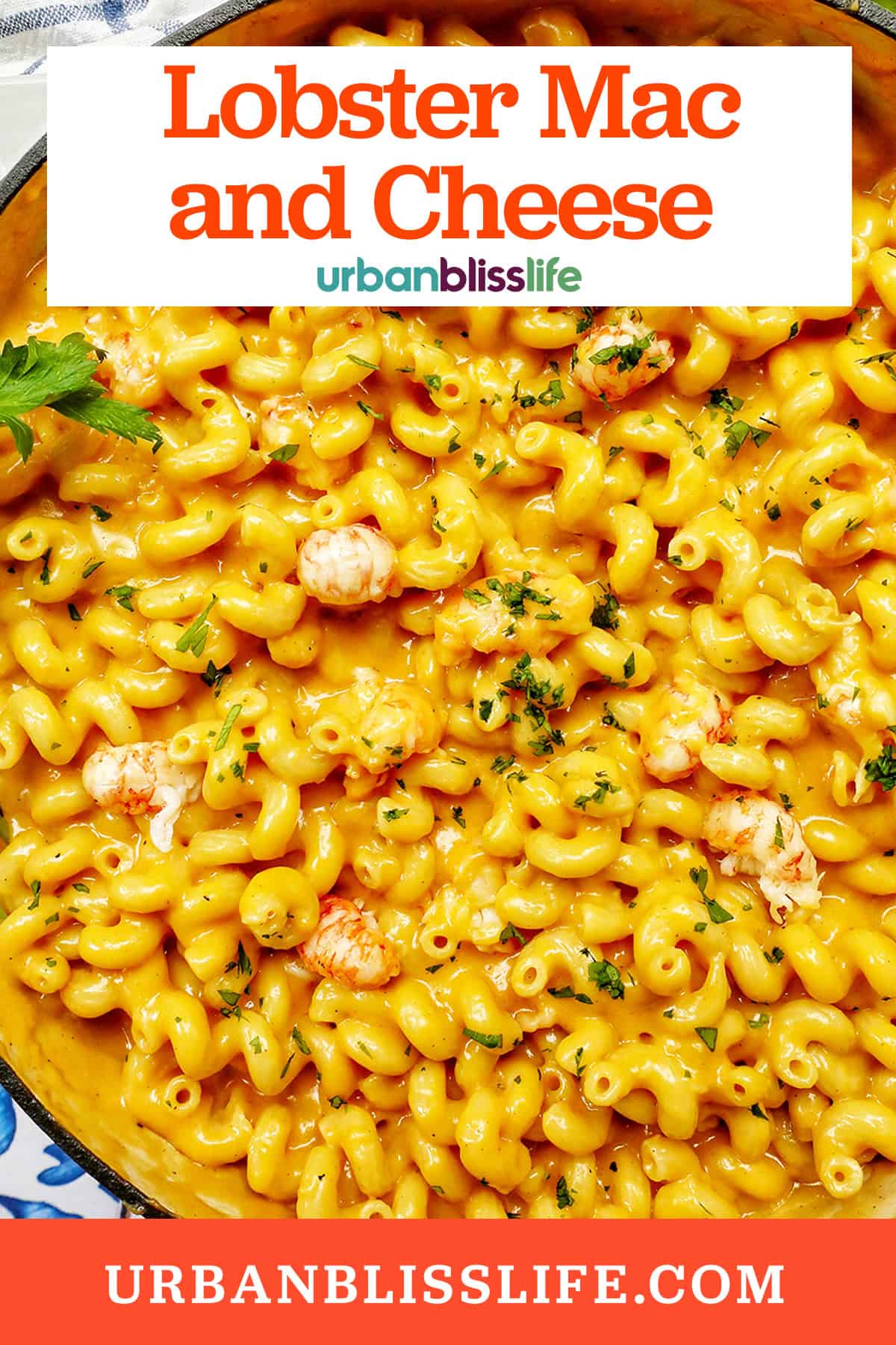 pan of lobster mac and cheese with title text overlay.