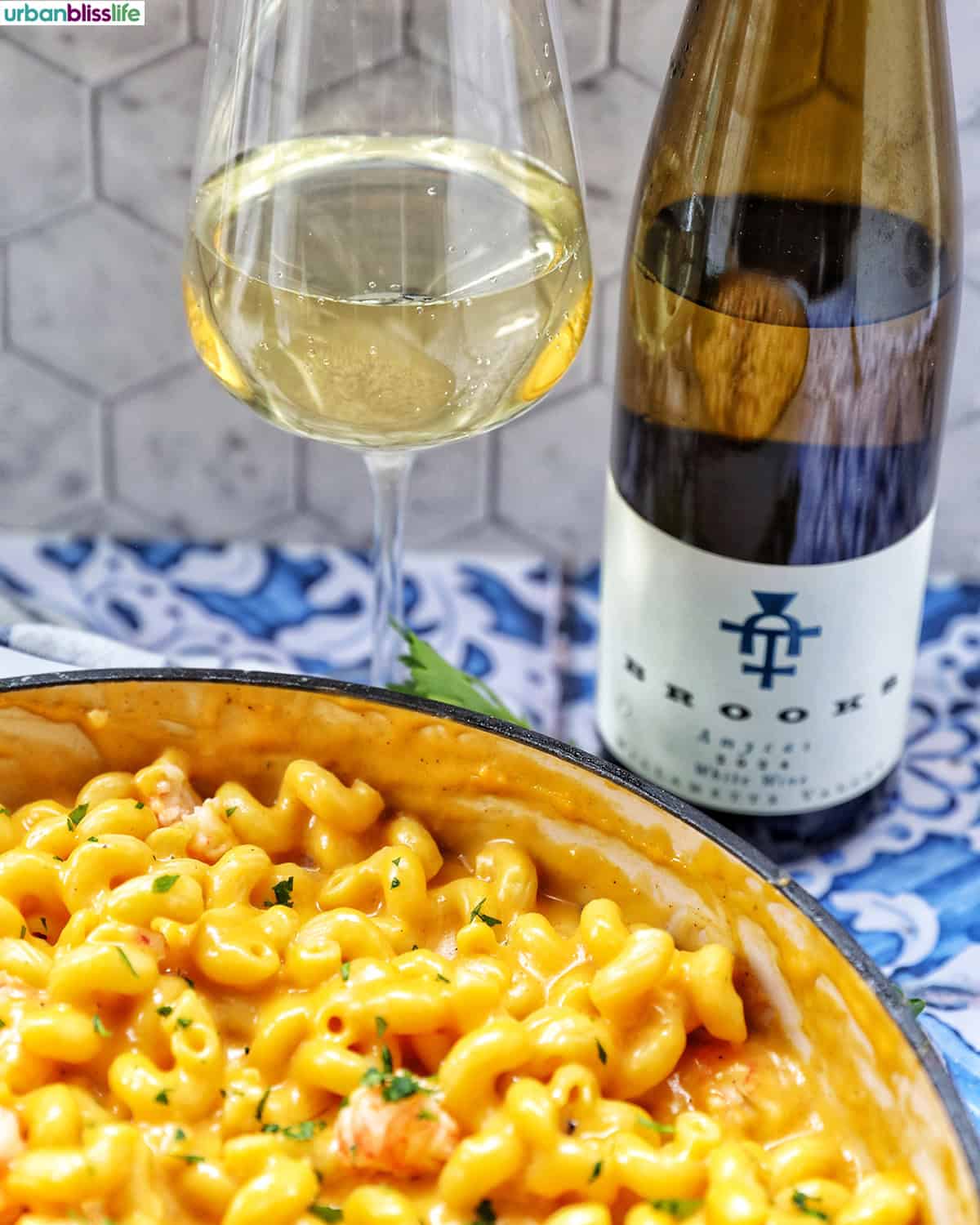 lobster mac and cheese with a glass of white wine.