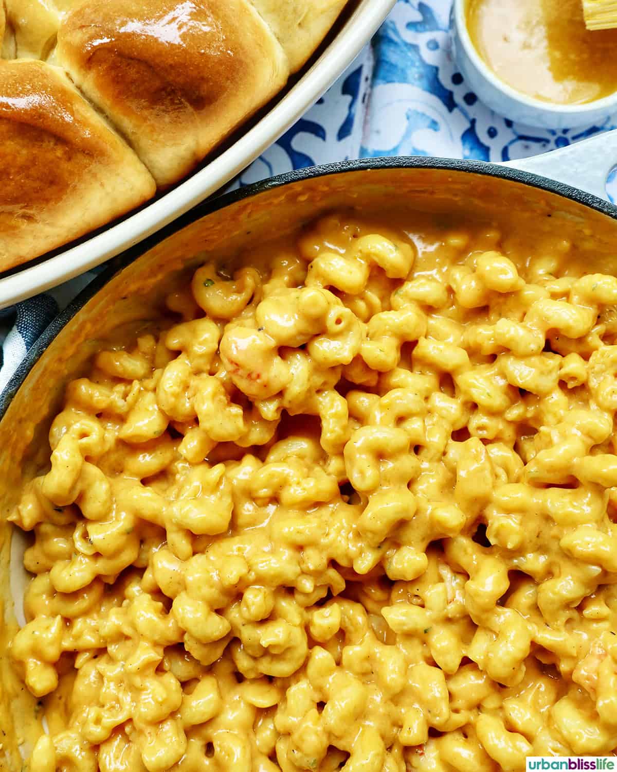 lobster mac and cheese with side of honey butter rolls.
