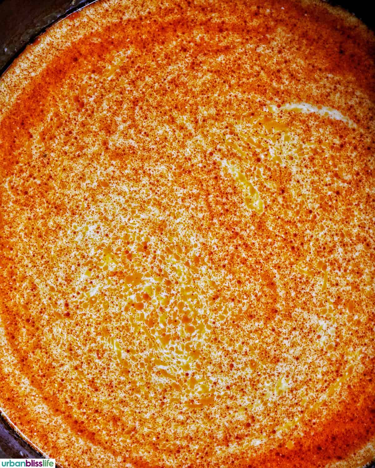 pot of Thai red curry soup.