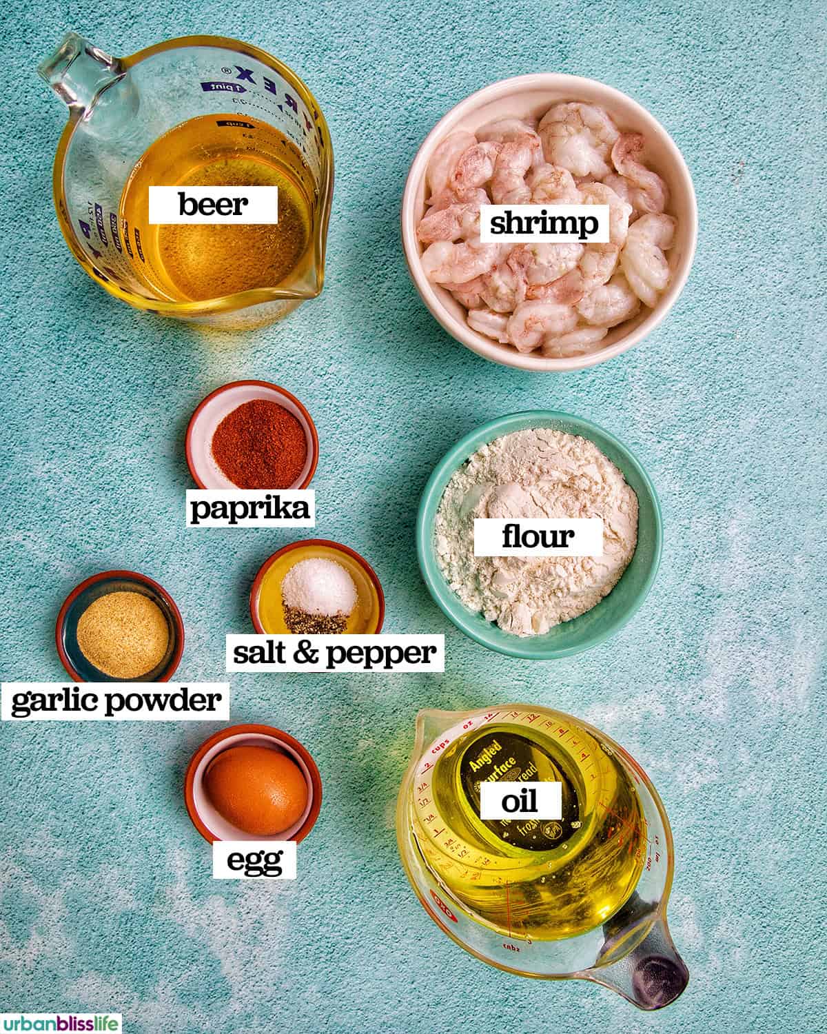 bowls of ingredients to make beer battered shrimp.