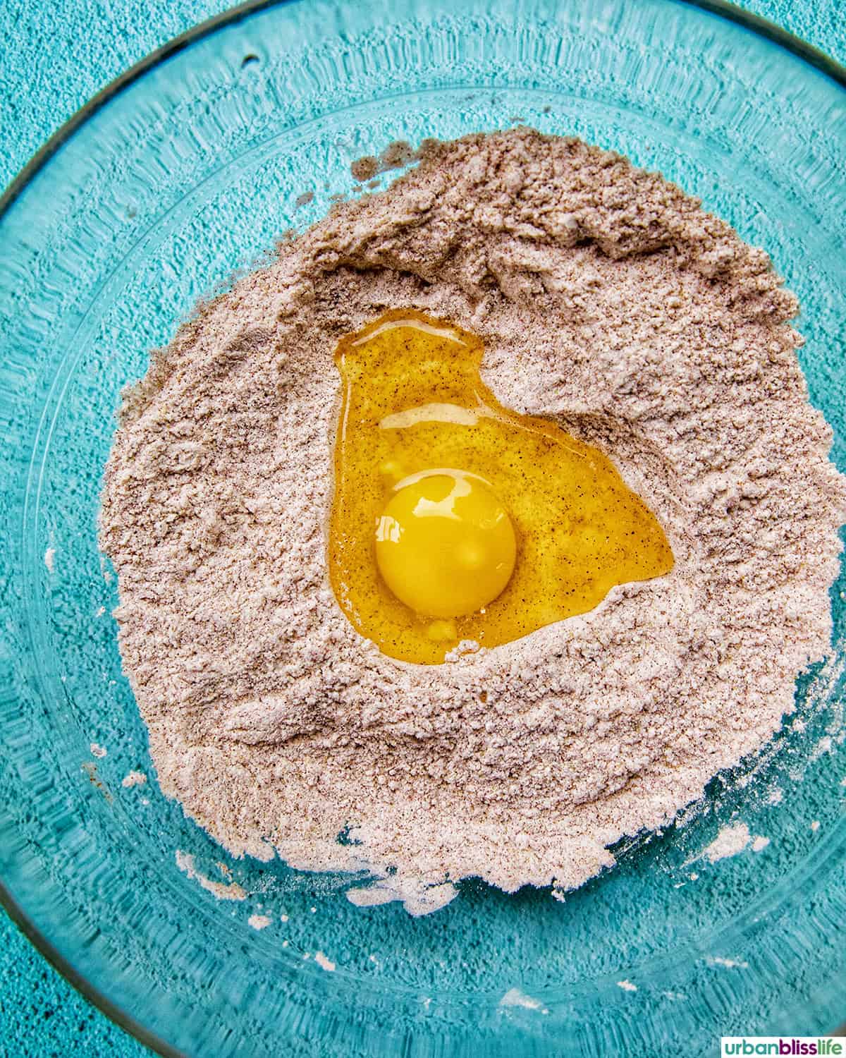 egg added to dry ingredients for beer battered shrimp