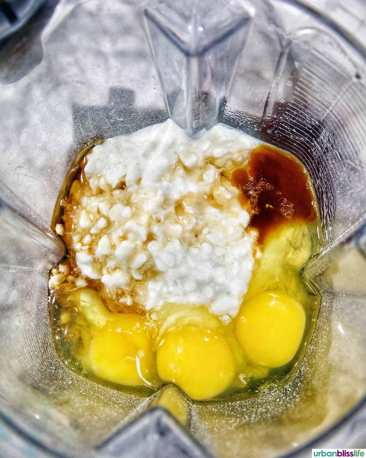 ingredients to make cottage cheese waffles in a blender.