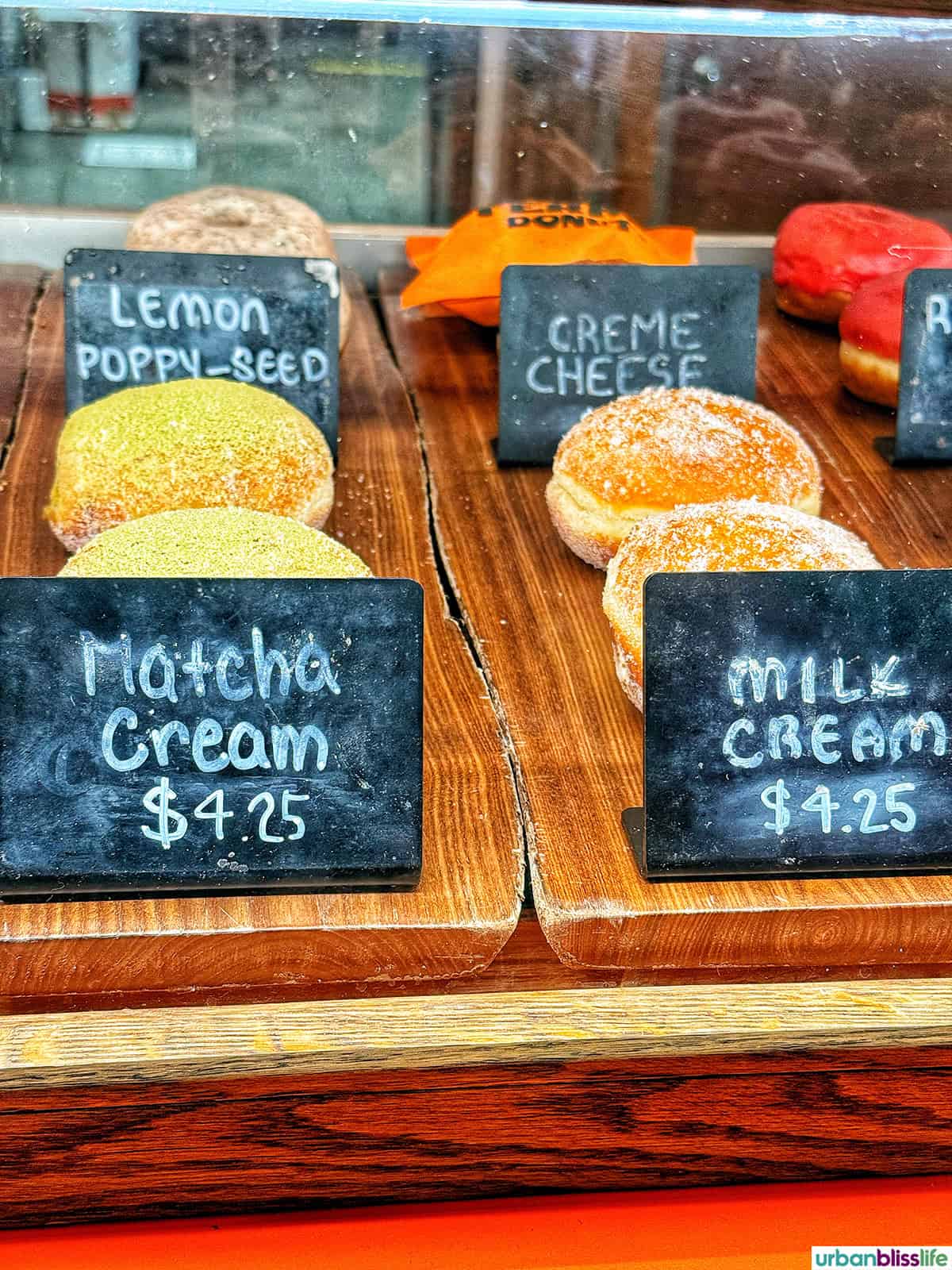Old Ferry Donuts Matcha cream and milk cream donuts.