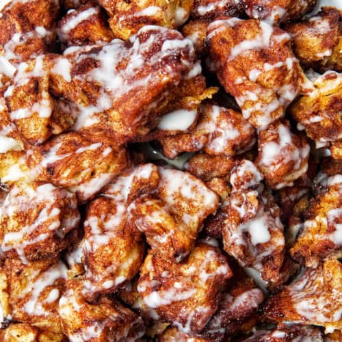 slow cooker monkey bread with vanilla icing.