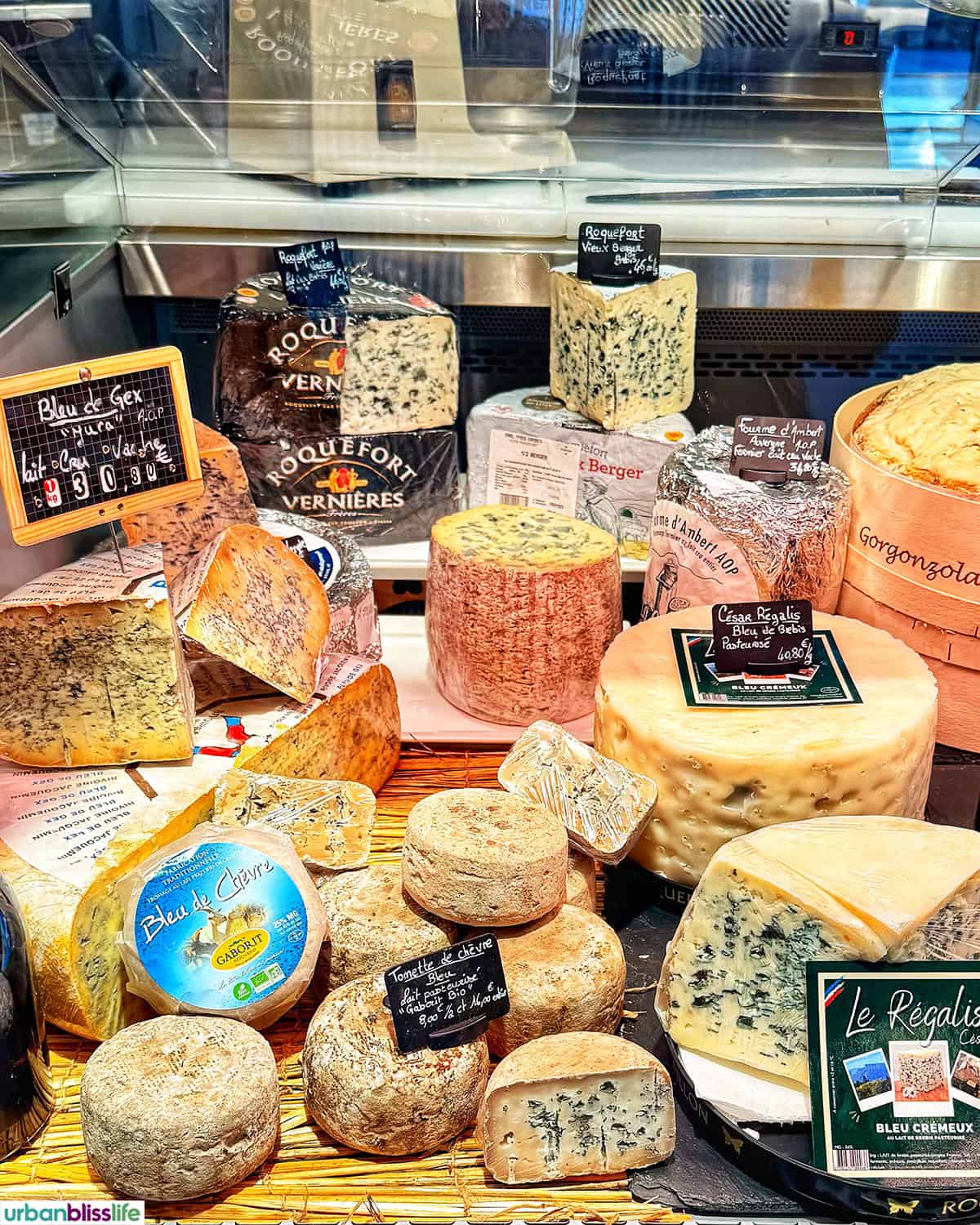 cheese stall at outdoor market in bergerac, france