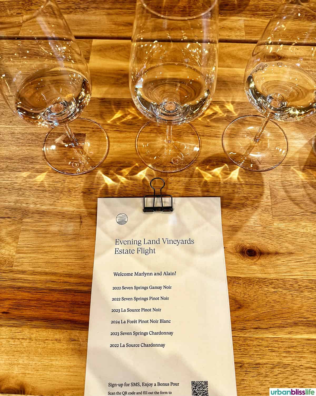 white wine tasting glasses and menu.