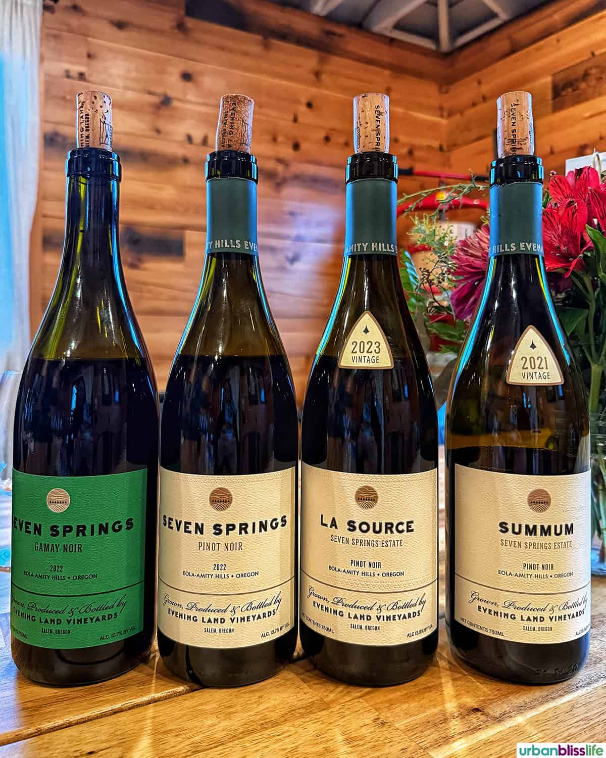 Evening Land Vineyards Pinot Noir and Gamay wine bottles.