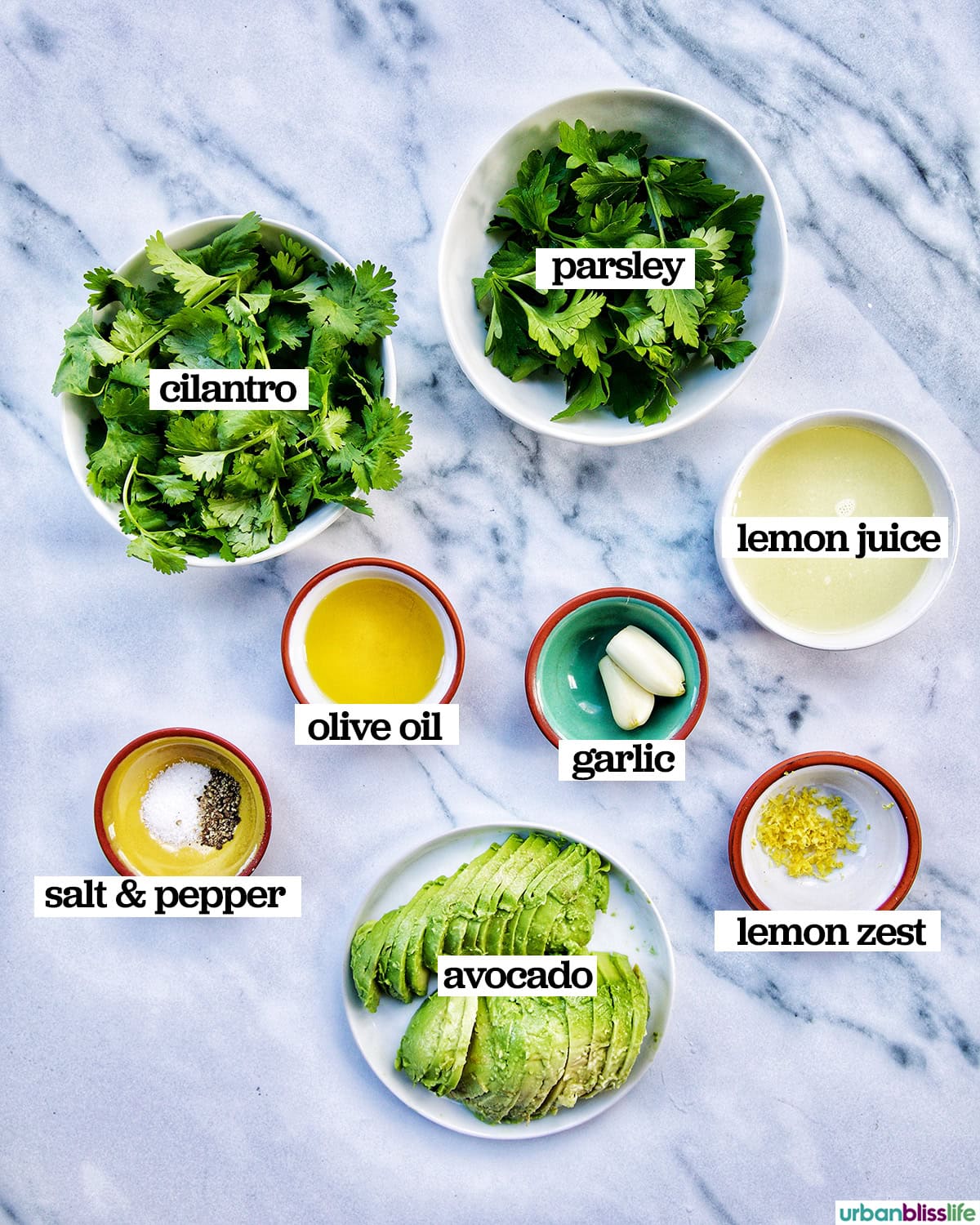 bowls of ingredients to make vegan green goddess dressing