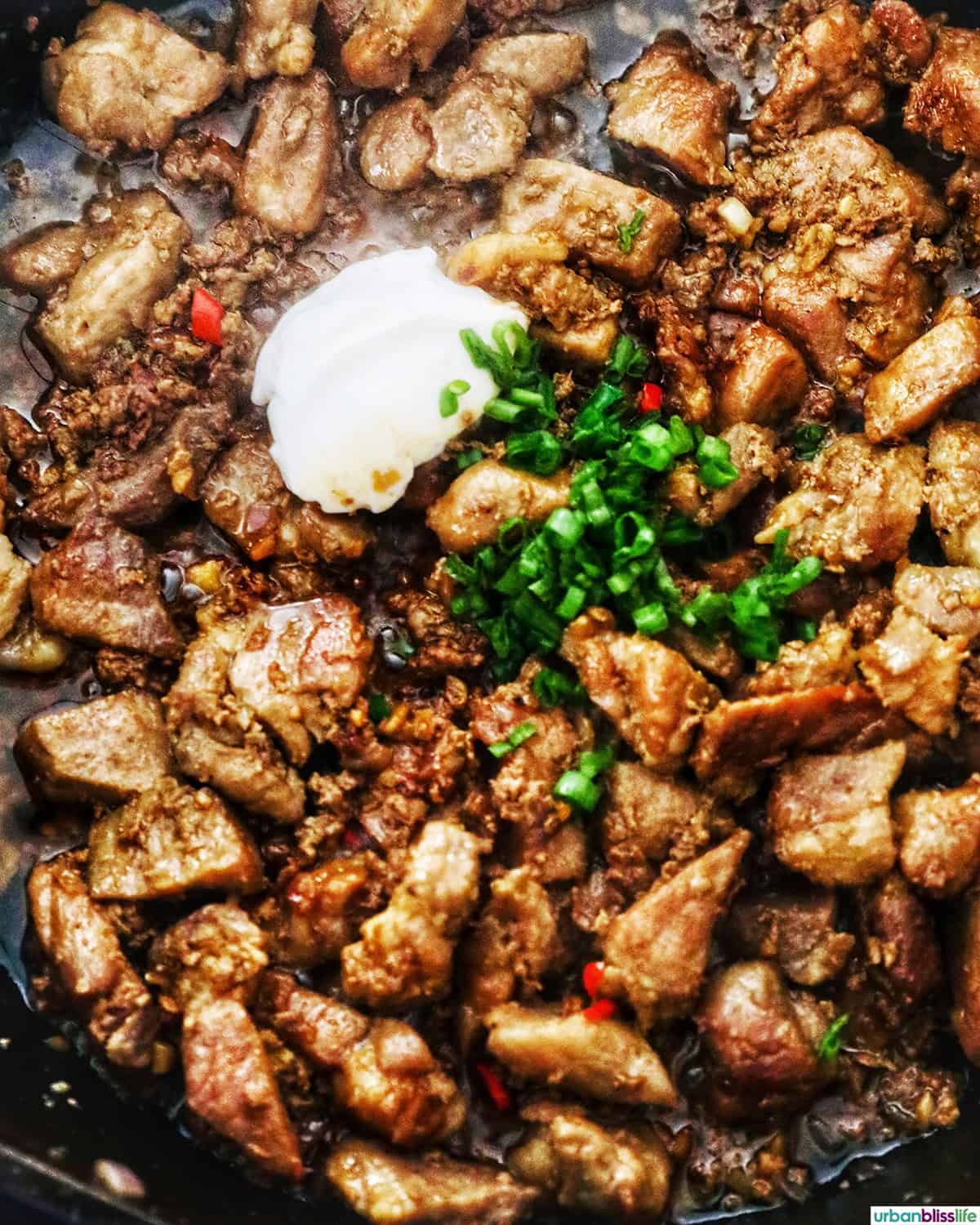 Filipino pork sisig in a pan.