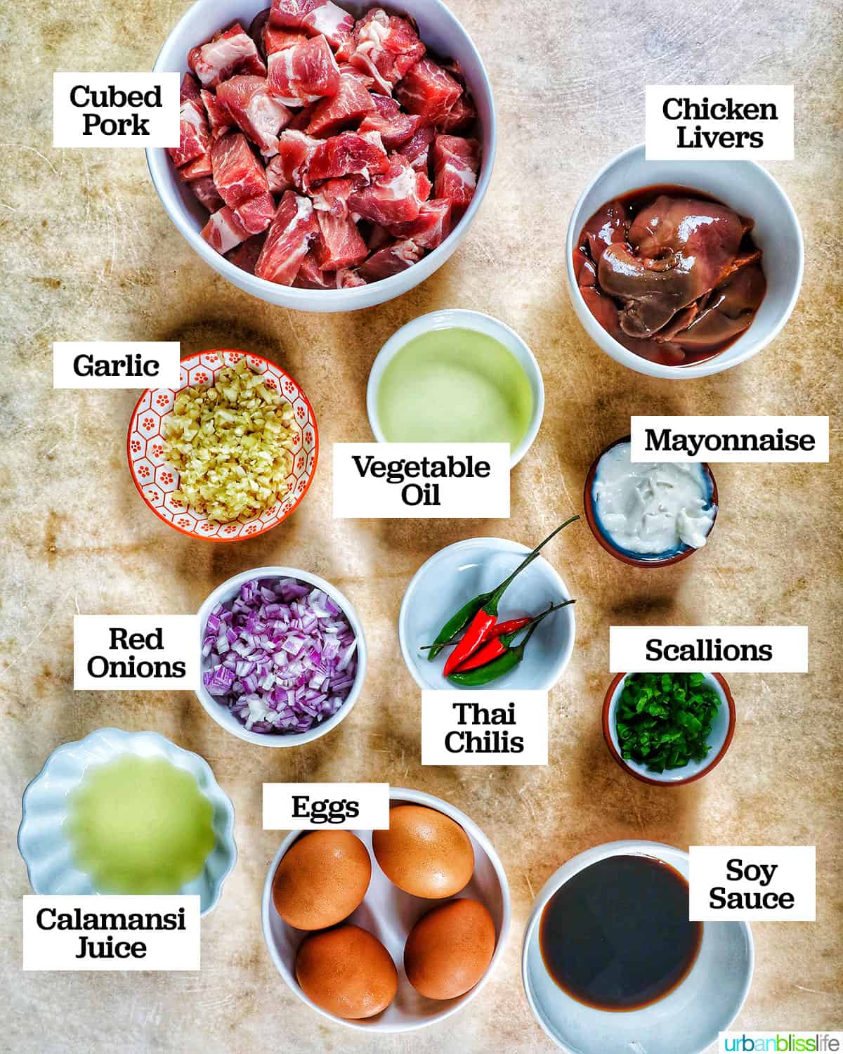 bowls of ingredients to make Filipino pork sisig.