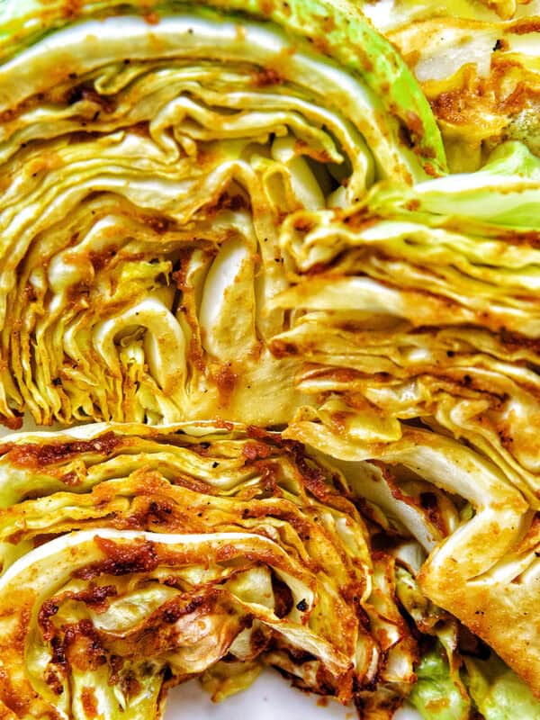 air fryer Asian cabbage steaks on a plate.
