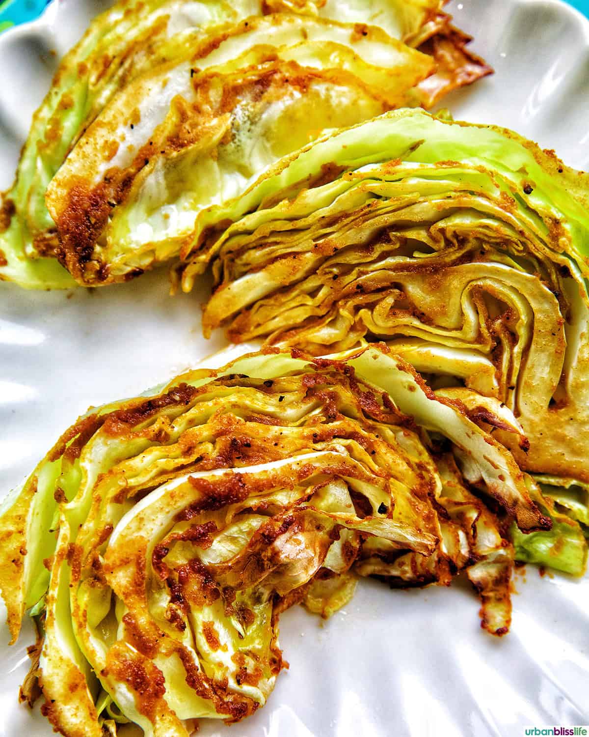 air fryer Asian cabbage steaks on a plate.