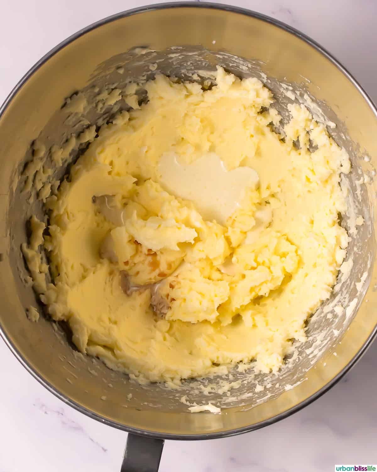 cookie dough in a stand mixer bowl.