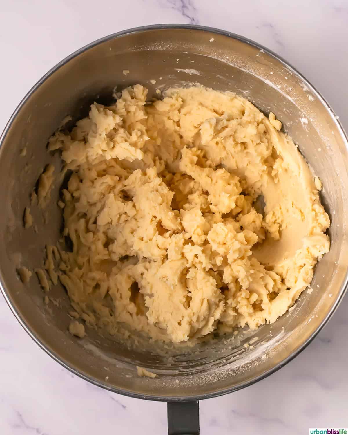 cookie dough in a stand mixer bowl.