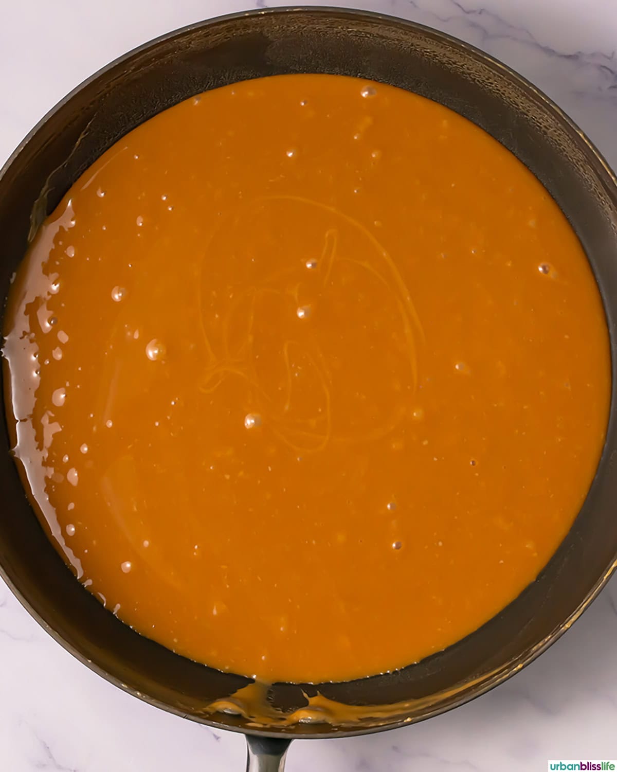 melted caramel in a pan.