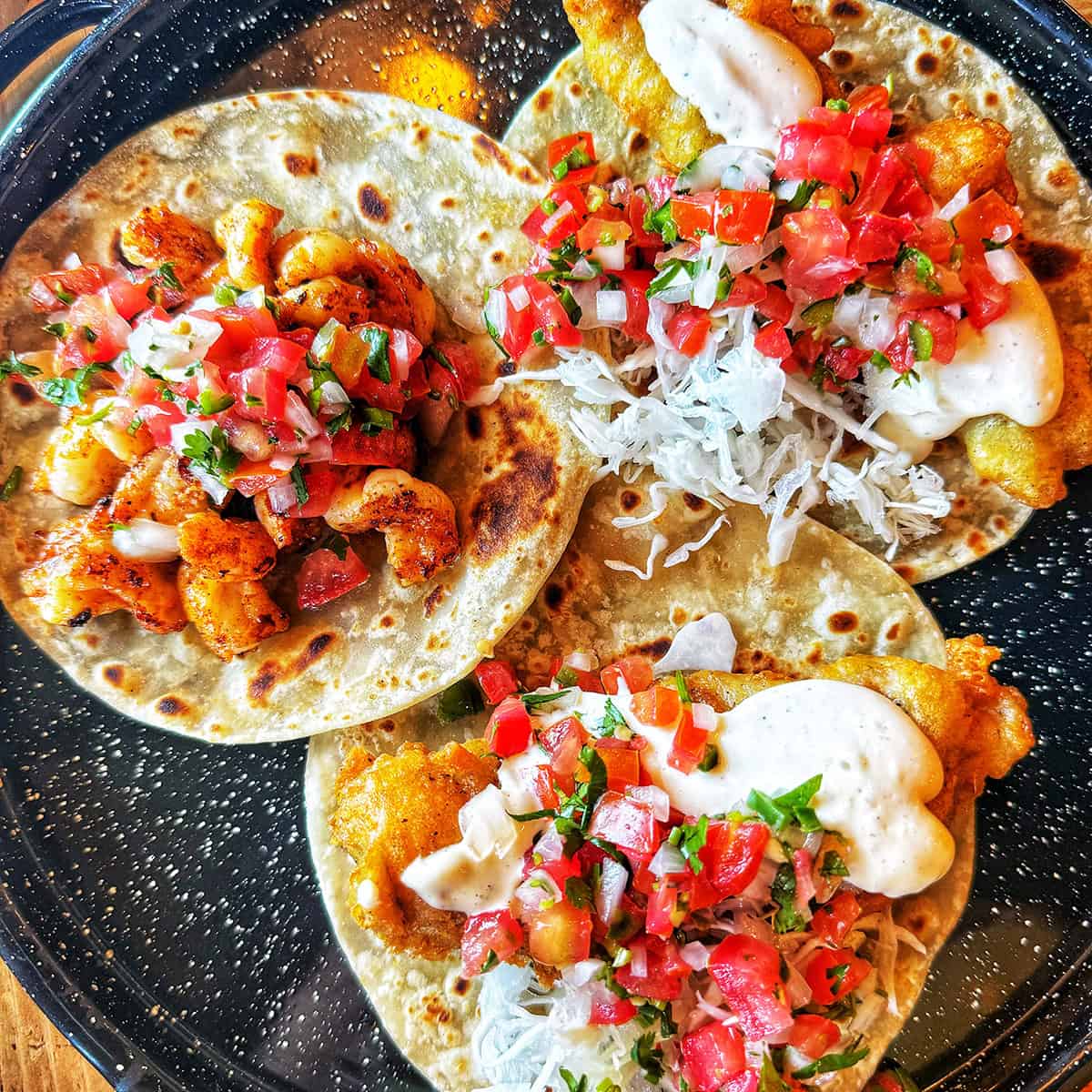 three seafood tacos from Mother Flower in Cabo San Lucas, Mexico.