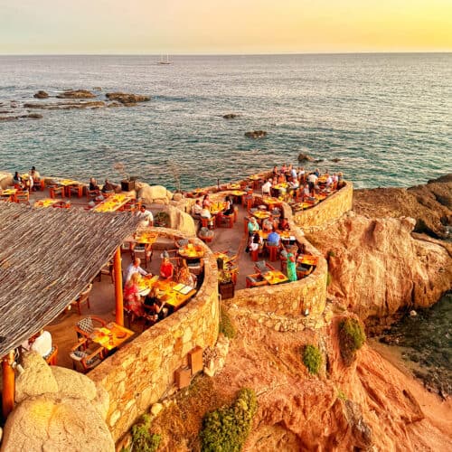 Cocina del Mar seaside fine dining restaurant tables by the Sea of Cortez in Cabo San Lucas.