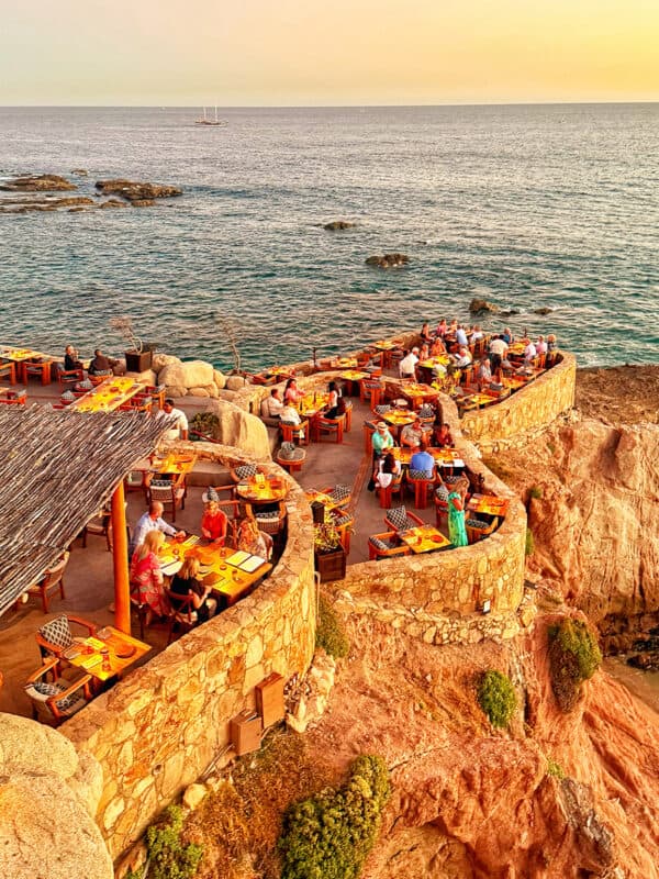 Cocina del Mar seaside fine dining restaurant tables by the Sea of Cortez in Cabo San Lucas.