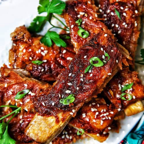 Instant Pot Asian Sticky Pork Ribs on a white plate.