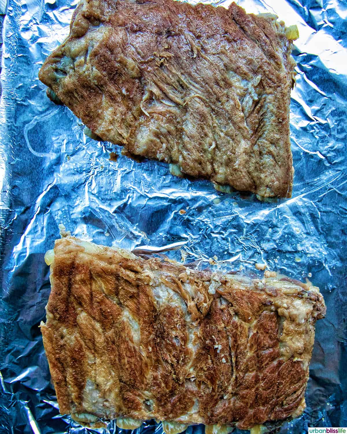 unsauced cooked Instant Pot Asian Sticky Pork Ribs on foil.