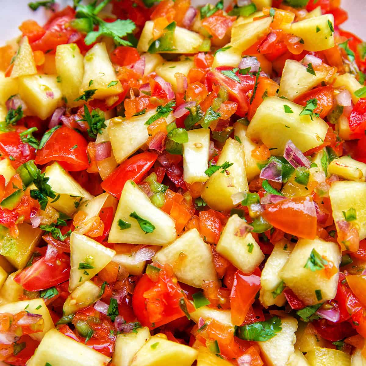 peach salsa with tomatoes, cilantro.