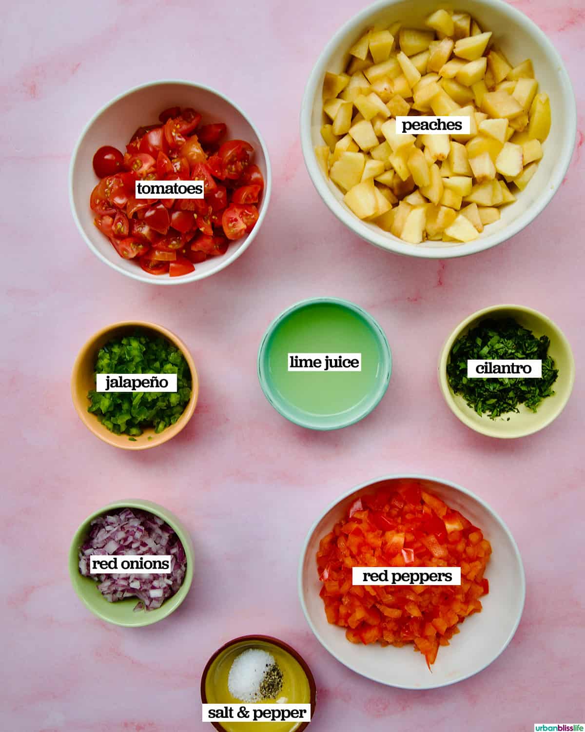 bowls of ingredients to make peach salsa.