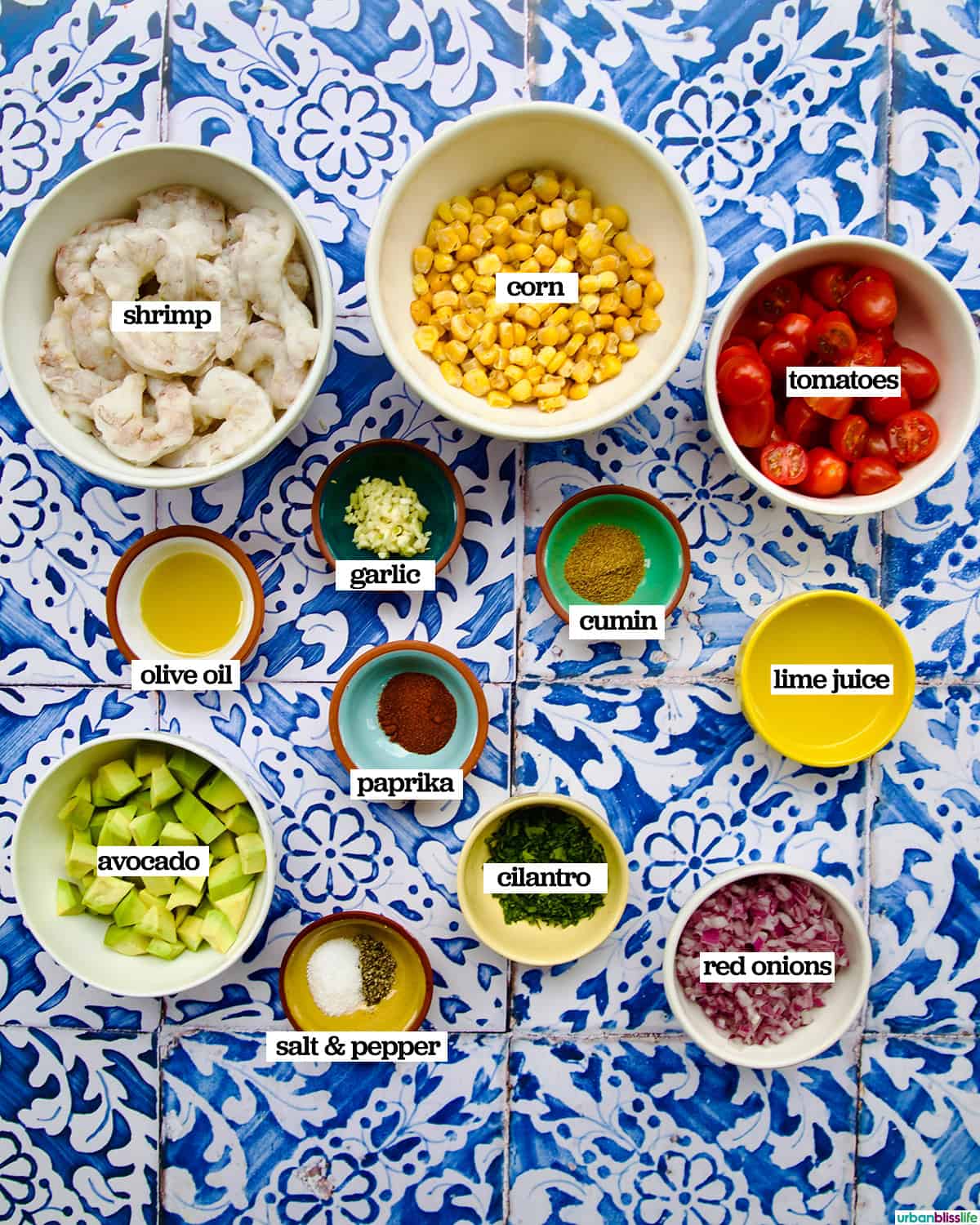 bowls of ingredients to make shrimp corn salad.
