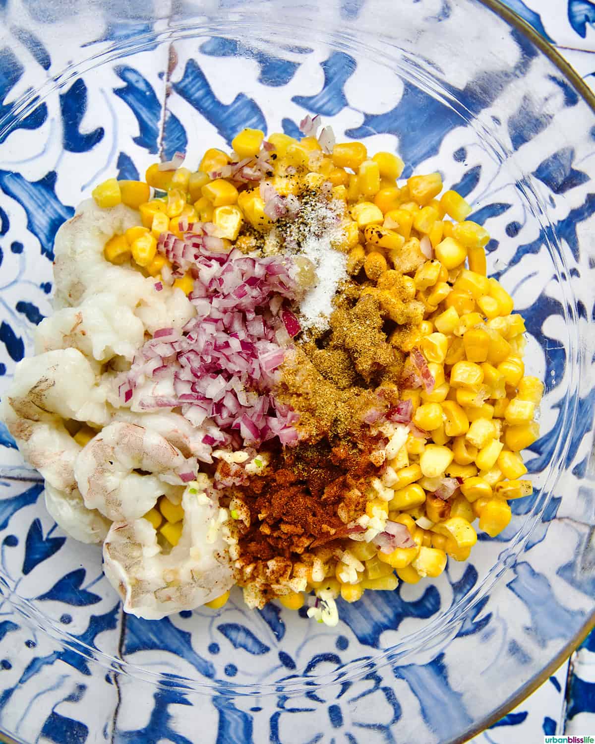 bowl of ingredients to make shrimp corn salad.