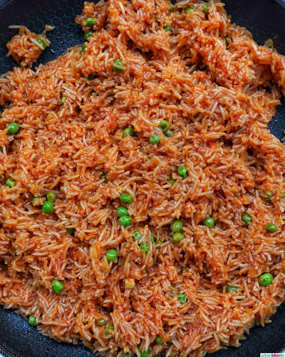 vegetarian Mexican rice and peas in a skillet.