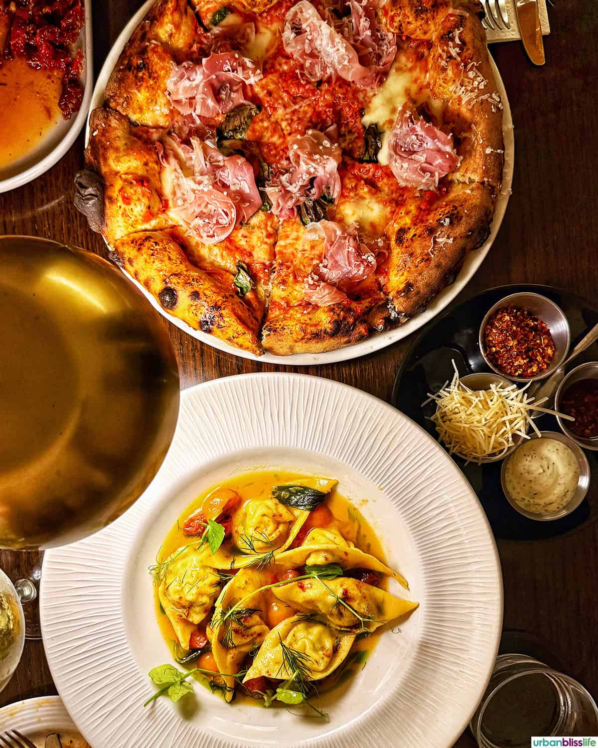 tortellini and pizza at come a casa in san jose del cabo