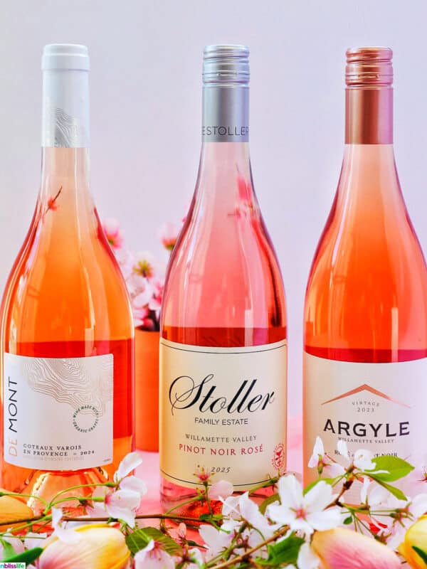 three bottles of rosé wines at Trader Joe's with cherry blossoms.