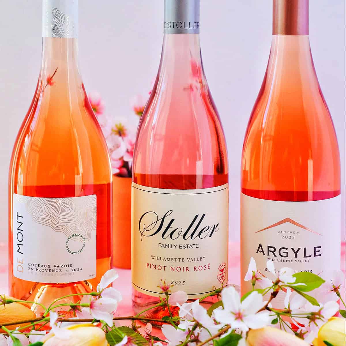 three bottles of rosé wines at Trader Joe's with cherry blossoms.
