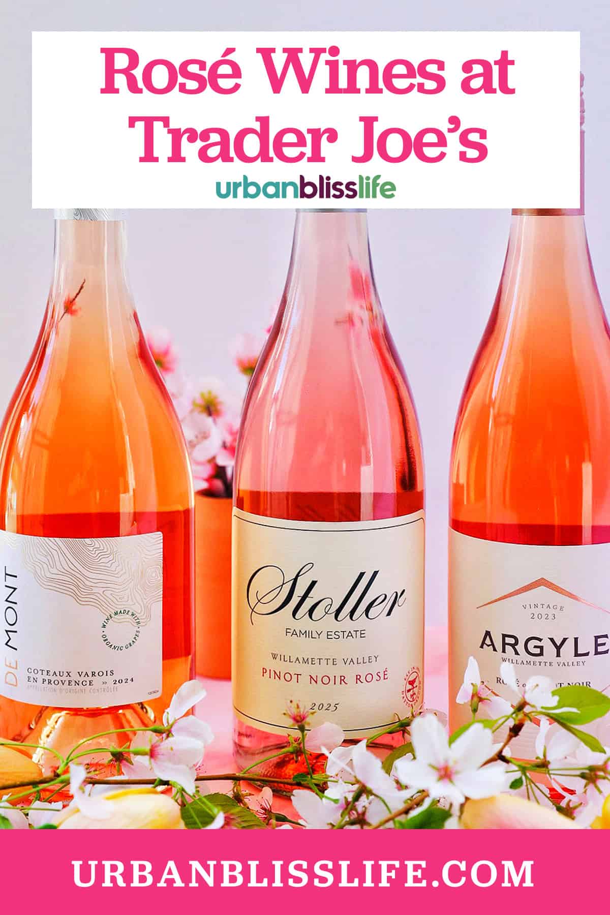 three bottles of rosé wines at Trader Joe's with cherry blossoms and title text overlay.