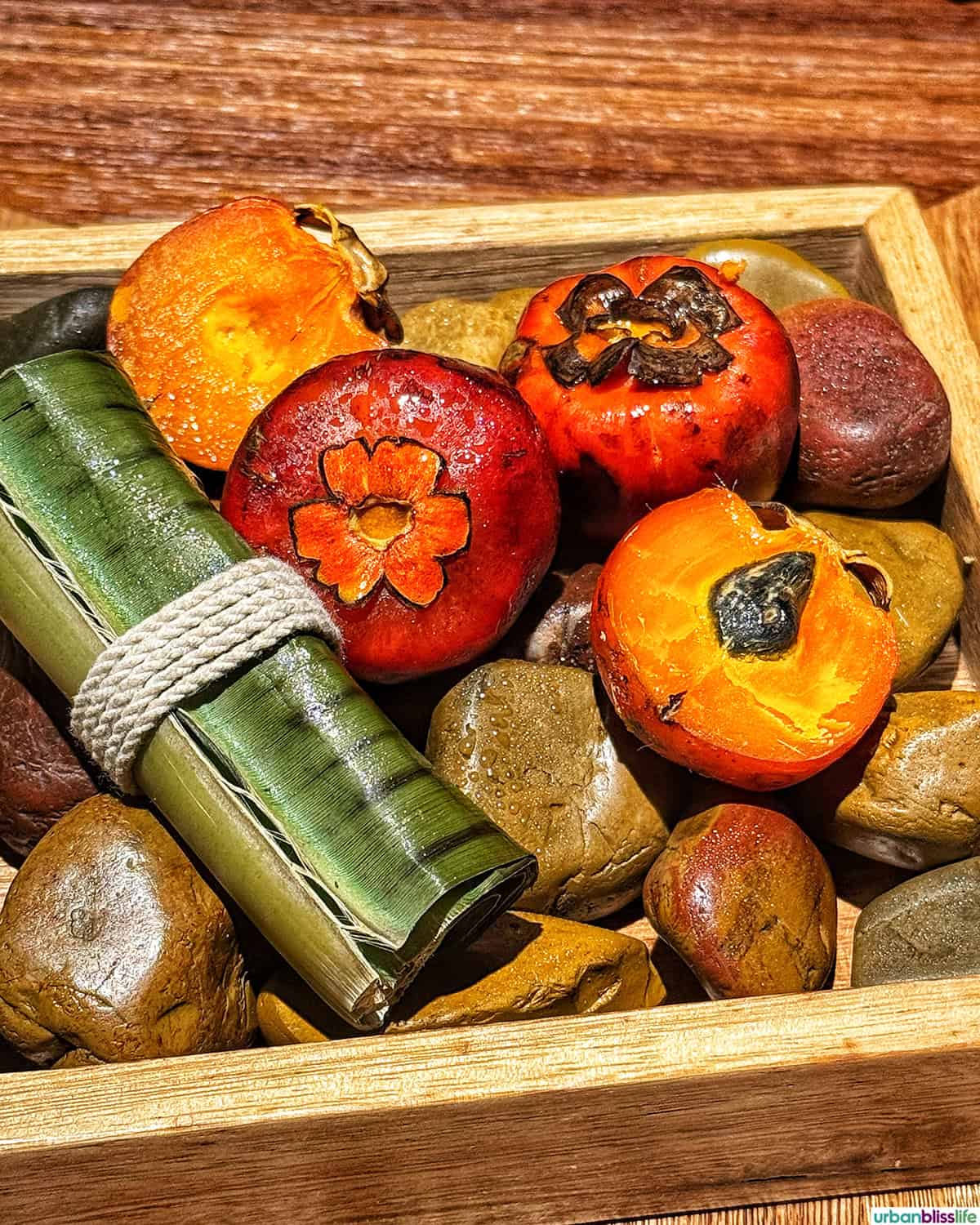 tray of tomatoes rocks peppers and other ingredients at El Chato restaurant in Bogota, Colombia.