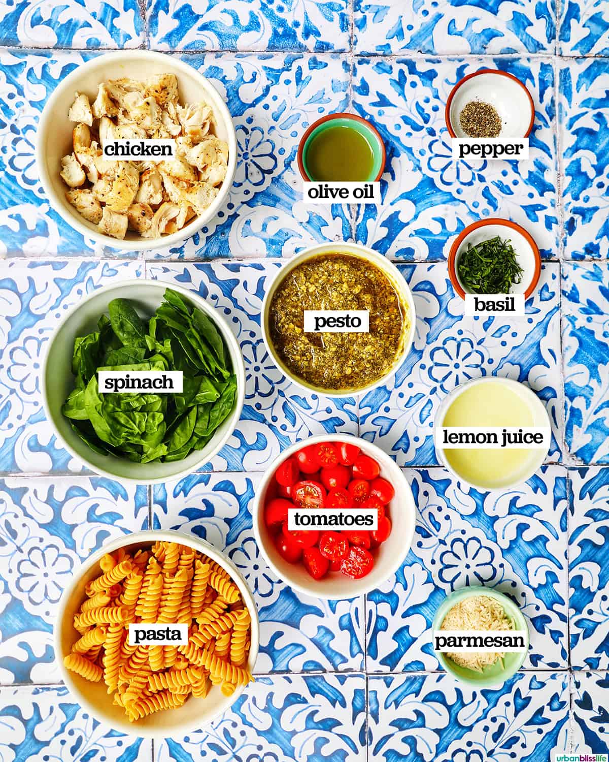 bowls of ingredients to make chicken pesto pasta salad.