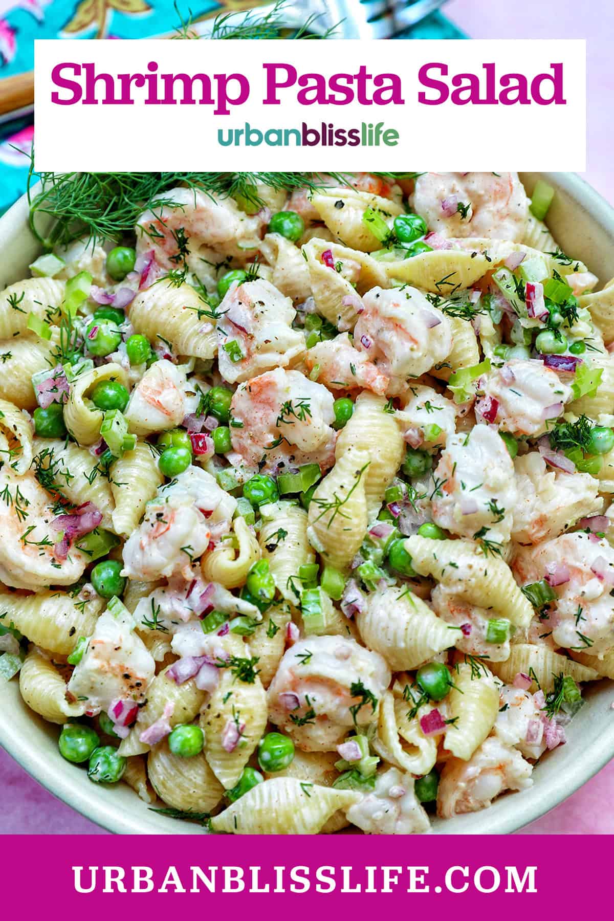 bowl of shrimp pasta salad with title text overlay.