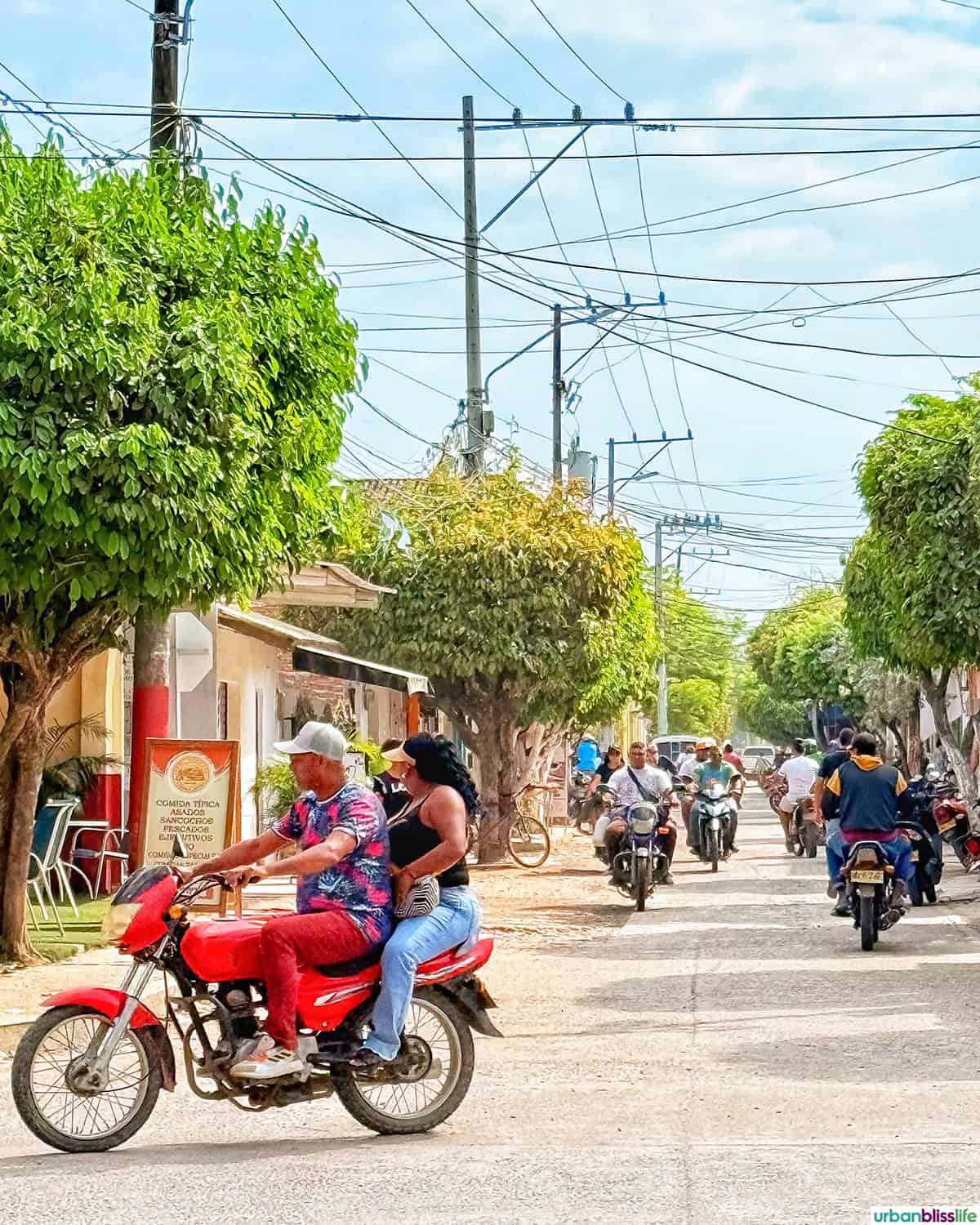 motorbikes in a busy street in Santa Cruz de Mompox, Colombia.