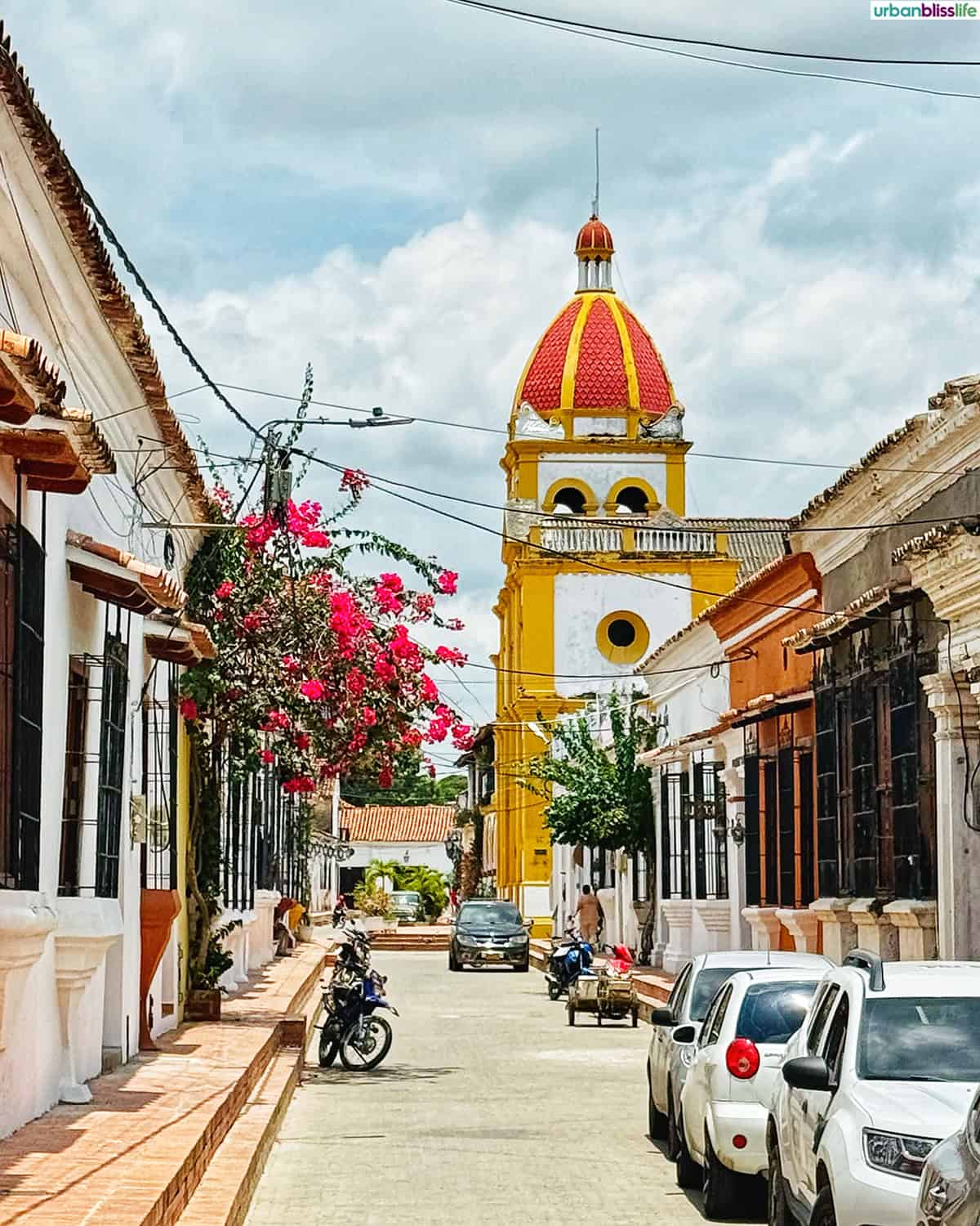 street with church in the background in Santa Cruz de Mompox, Colombia.